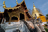 Chiang Mai - The Wat Phra Singh temple. The small Viharn Lai Kham (Gilded Hall) a classic Lanna architecture. Note the roof finials. 